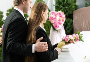 comforting a friend during a funeral