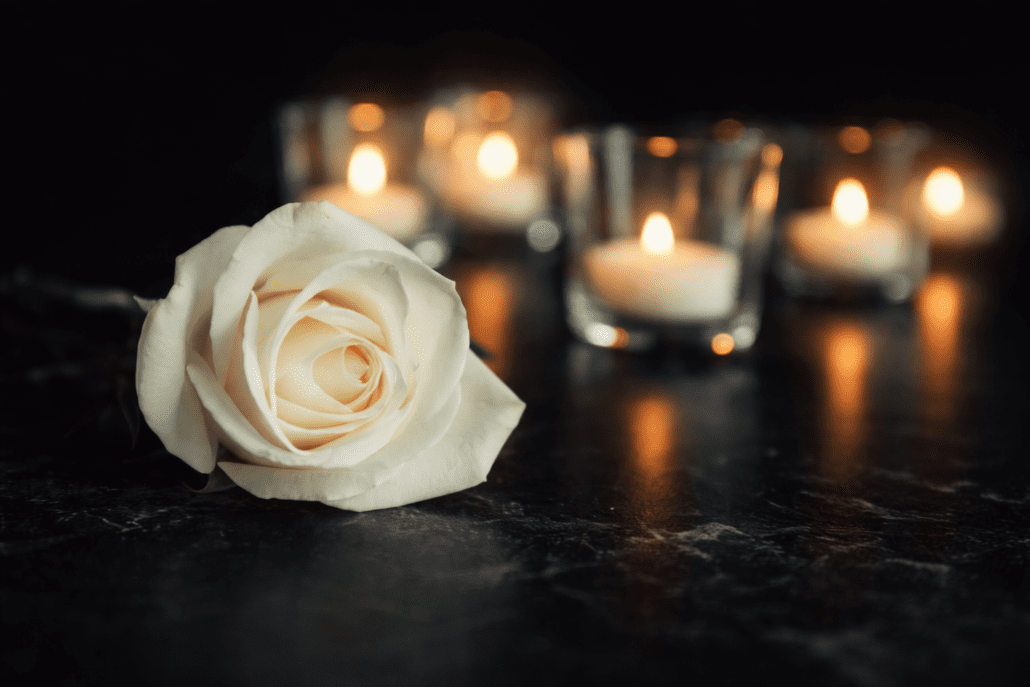 White Rose with Candles at Funeral
